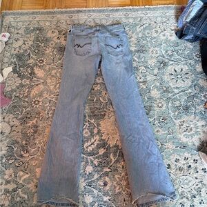 Low rise light wash Blue flared distressed Women's Jeans